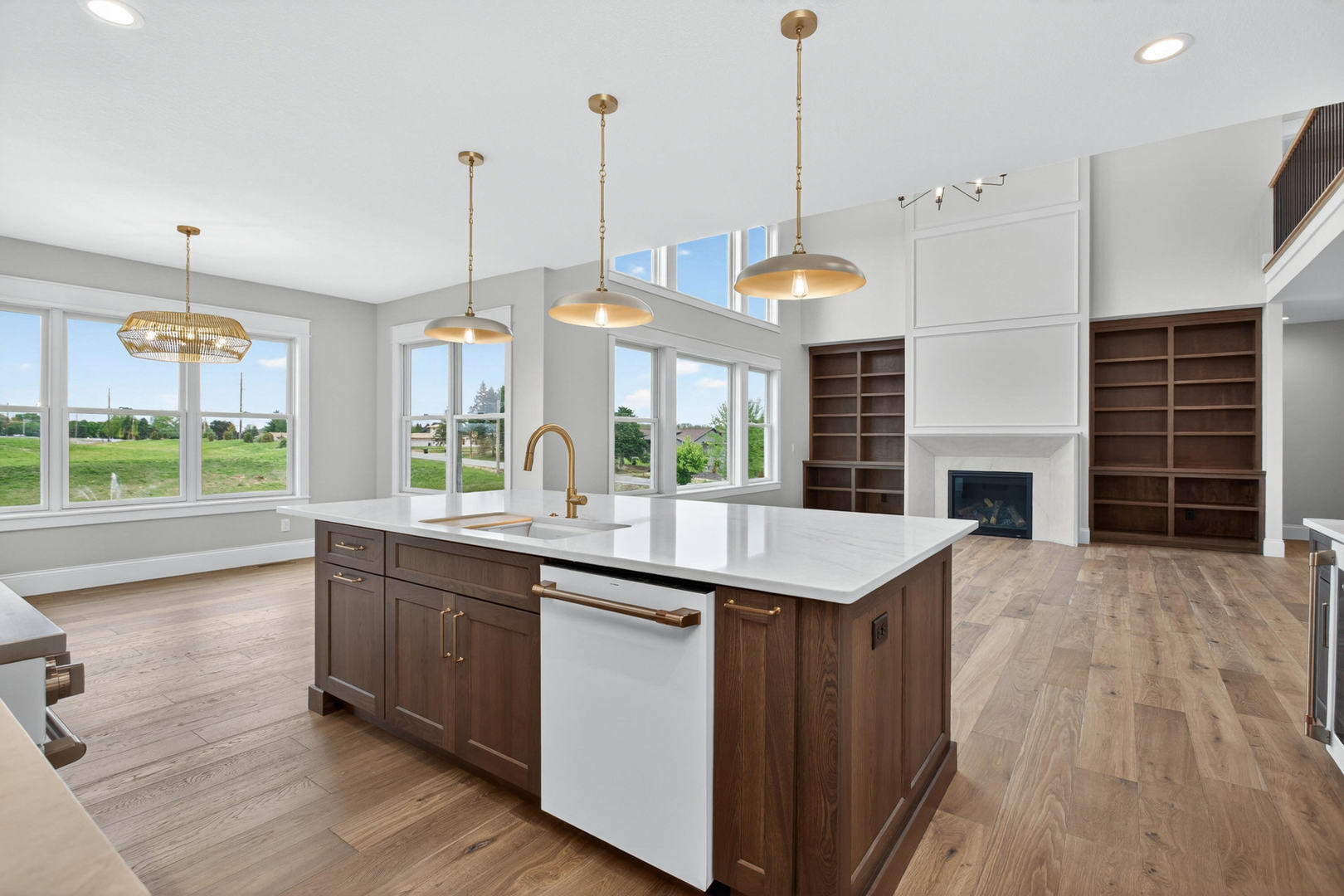 6928 Wilderness Pointe Bettendorf, IA 52722 - Photo 19 of 48 a kitchen with a sink a counter top space and stainless steel appliances