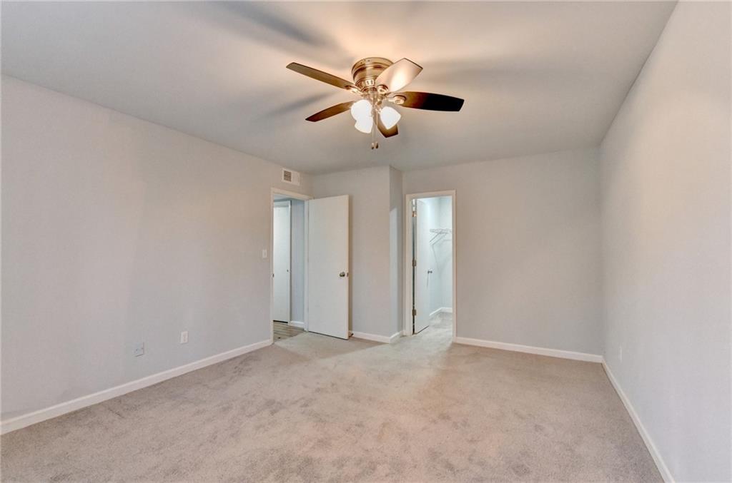 516 Wynnes Ridge Circle Southeast, Unit 516 Marietta, GA 30067 - Photo 25 of 40 a view of an empty room with a window