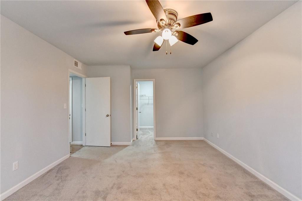 516 Wynnes Ridge Circle Southeast, Unit 516 Marietta, GA 30067 - Photo 26 of 40 wooden floor in an empty room