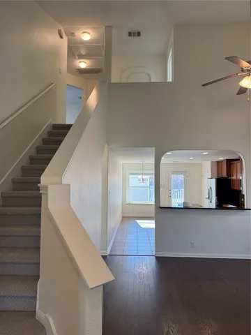 a view of a hallway with staircase