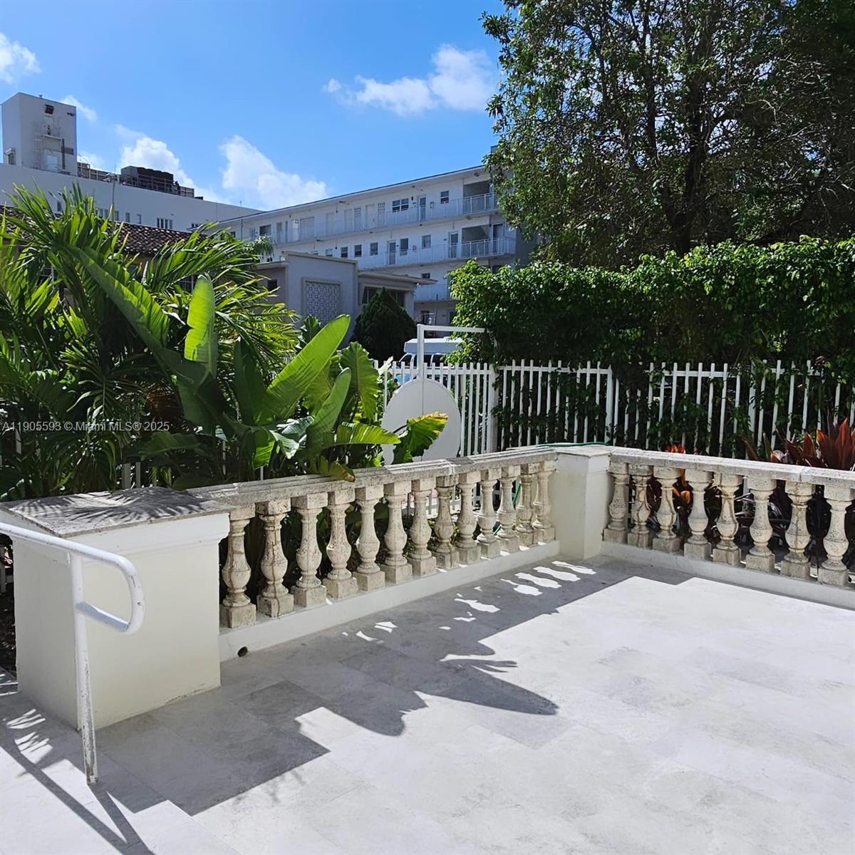 1542 Drexel Avenue, Unit 208 Miami Beach, FL 33139 - Photo 2 of 9 a view of street with balcony