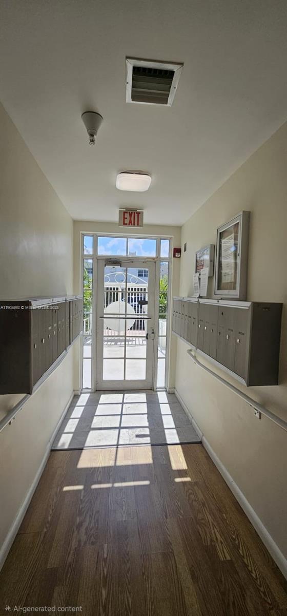 1542 Drexel Avenue, Unit 208 Miami Beach, FL 33139 - Photo 8 of 9 a view of kitchen with refrigerator and window