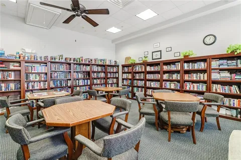 a view of a workspace with furniture