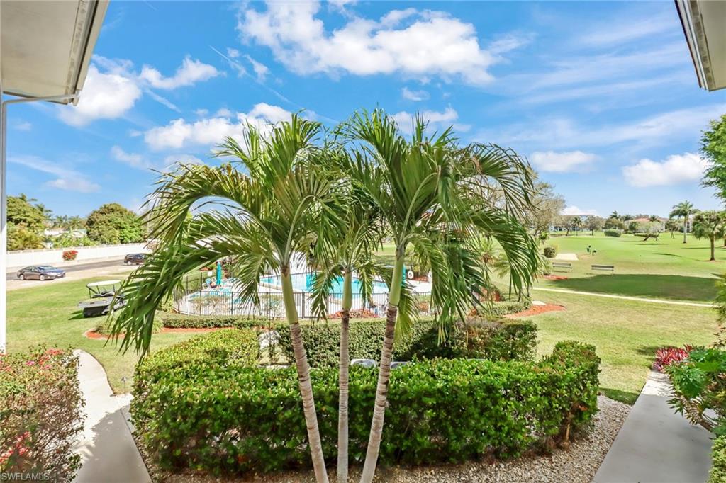 5 High Point Circle West, Unit 211 Naples, FL 34103 - Photo 4 of 44 unit is close to pool