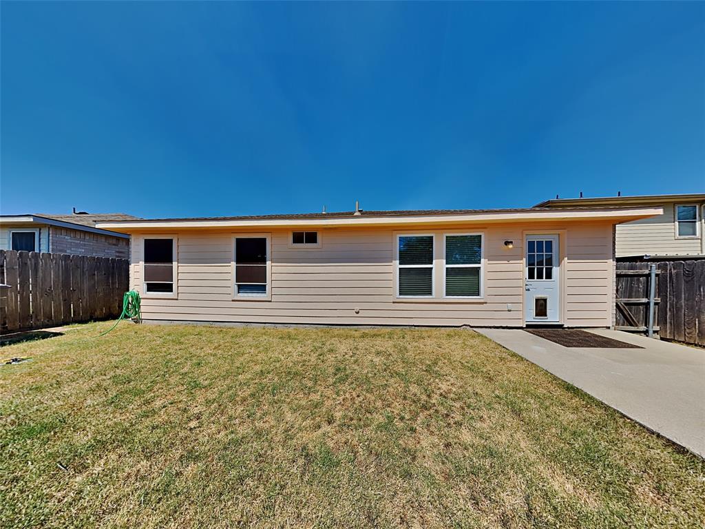 3808 Bandera Ranch Road Fort Worth, TX 76262 - Photo 15 of 15 a front view of a house with a yard