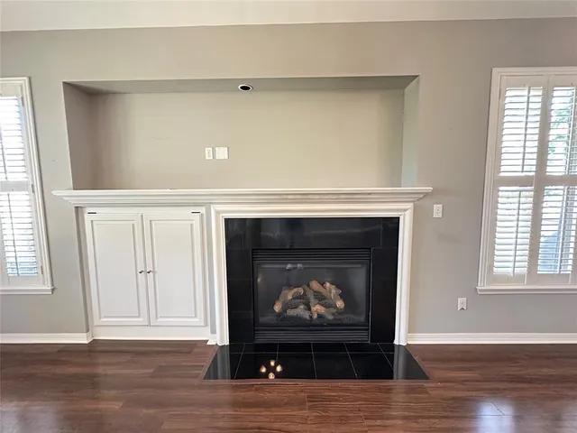a living room with a fireplace
