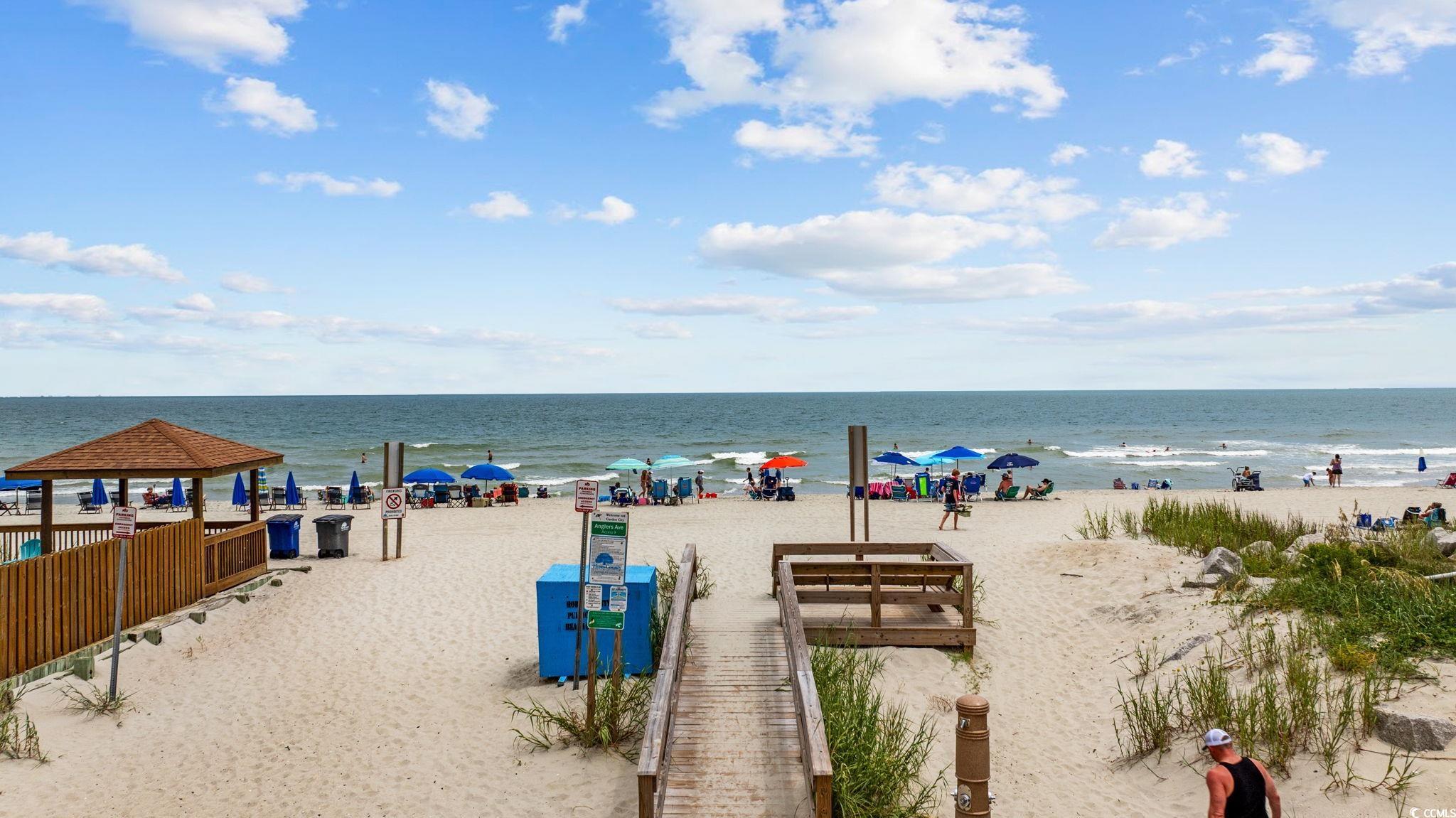 720 North Waccamaw Drive, Unit 301 Murrells Inlet, SC 29576 - Photo 25 of 37 Water view with nearby beach and a gazebo