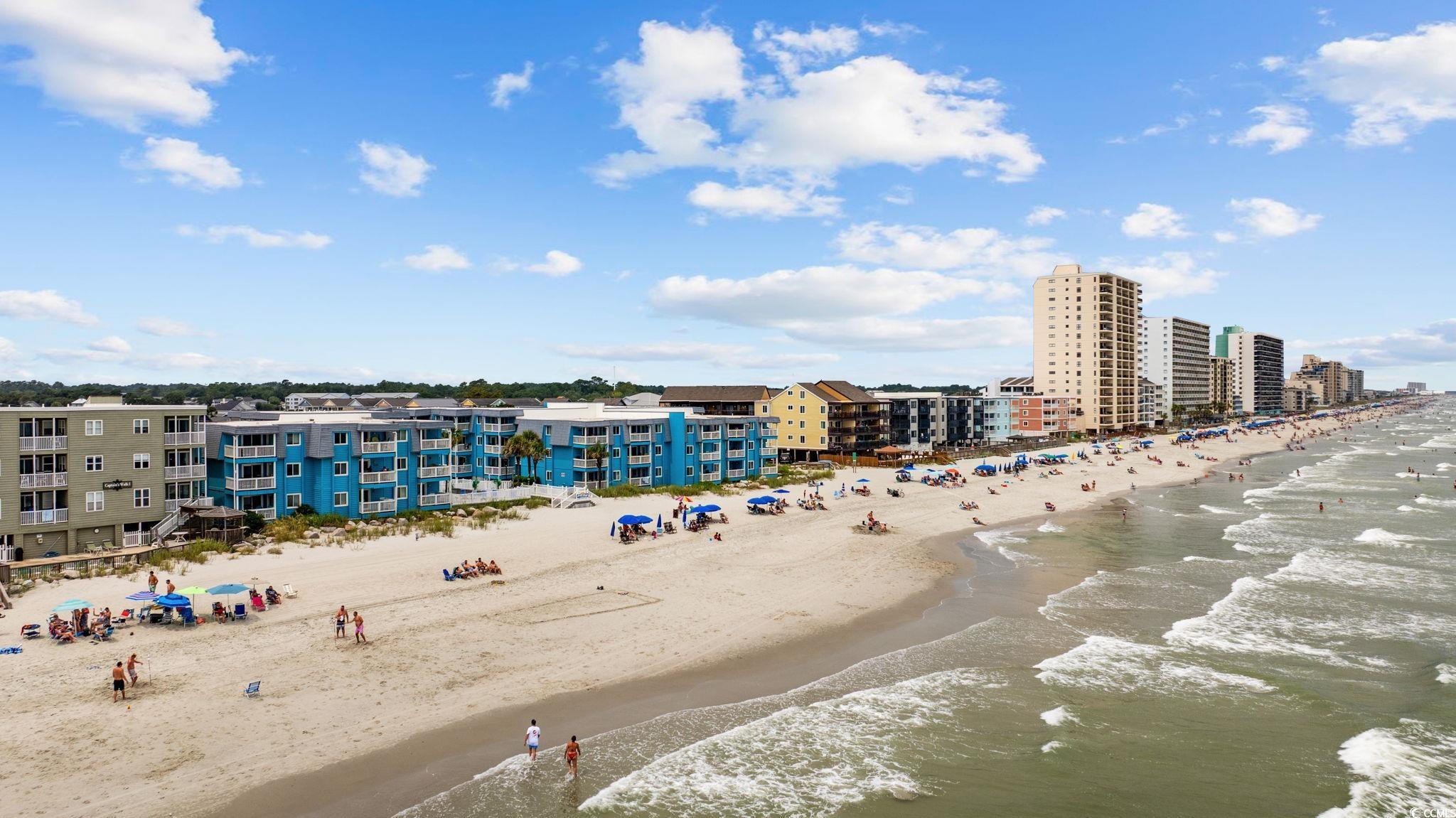 720 North Waccamaw Drive, Unit 301 Murrells Inlet, SC 29576 - Photo 27 of 37 Water view with local beach and nearby urban area