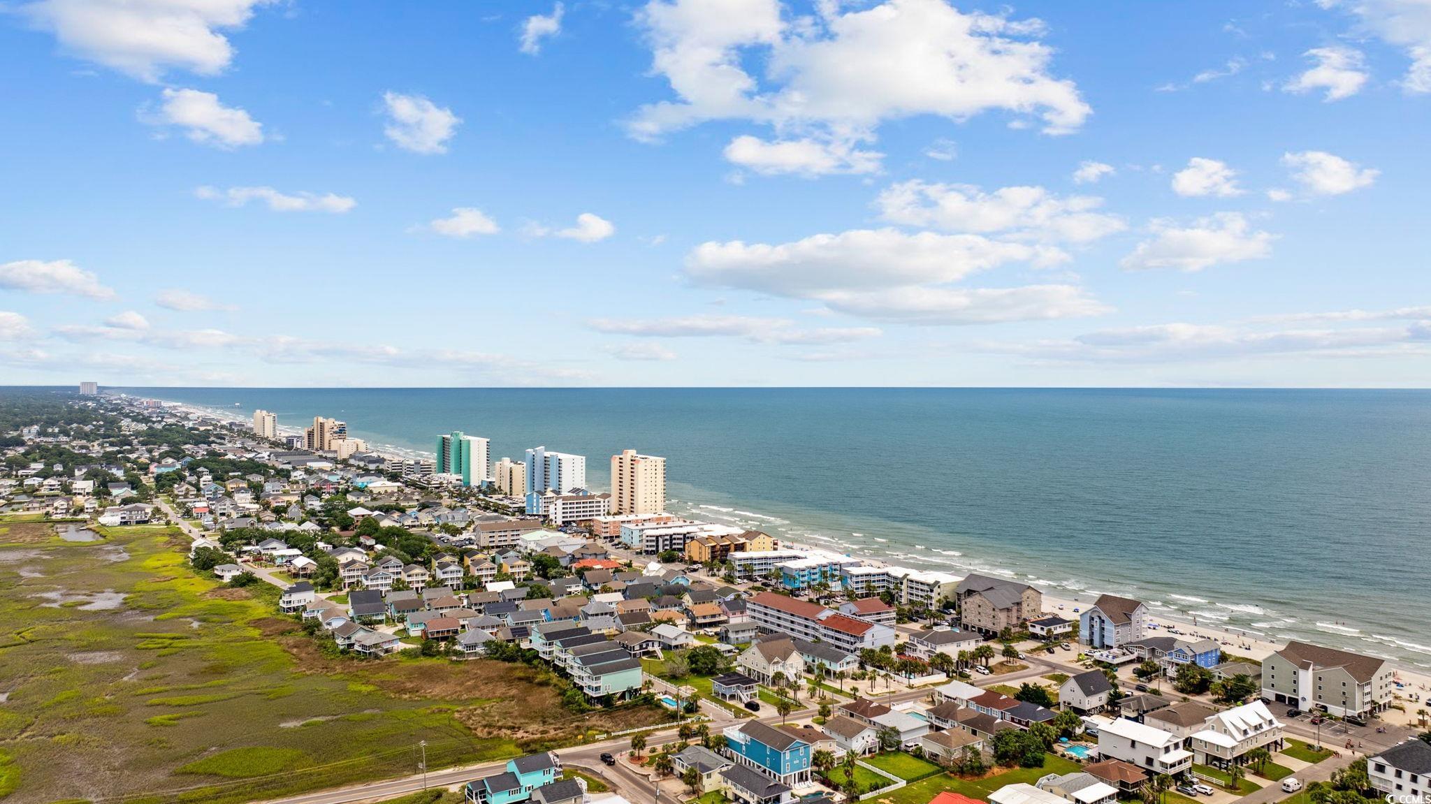 720 North Waccamaw Drive, Unit 301 Murrells Inlet, SC 29576 - Photo 33 of 37 View of urban area featuring expansive beach and nearby suburban area