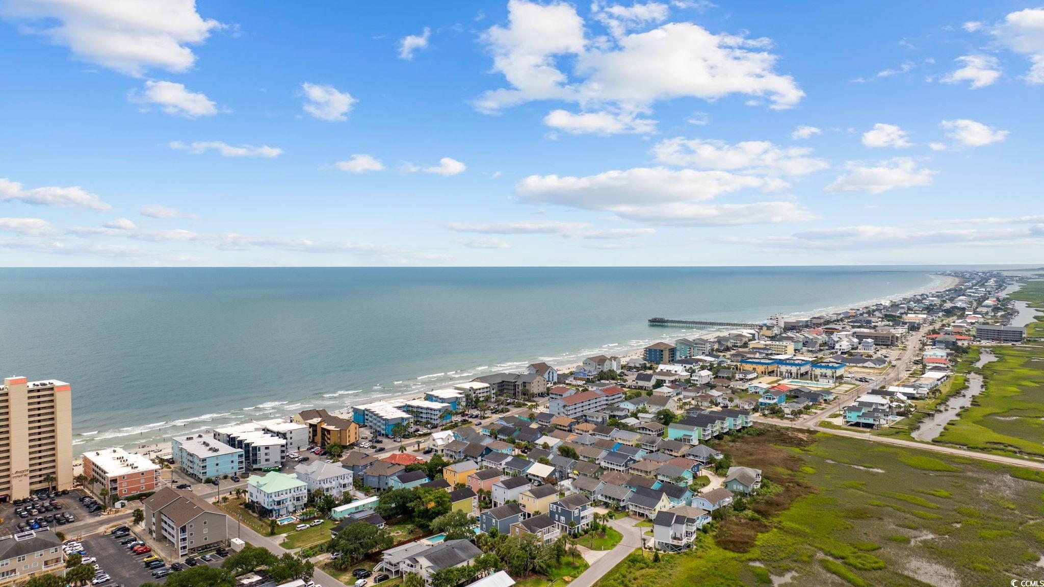 720 North Waccamaw Drive, Unit 301 Murrells Inlet, SC 29576 - Photo 35 of 37 Aerial perspective of suburban area with expansive coastline