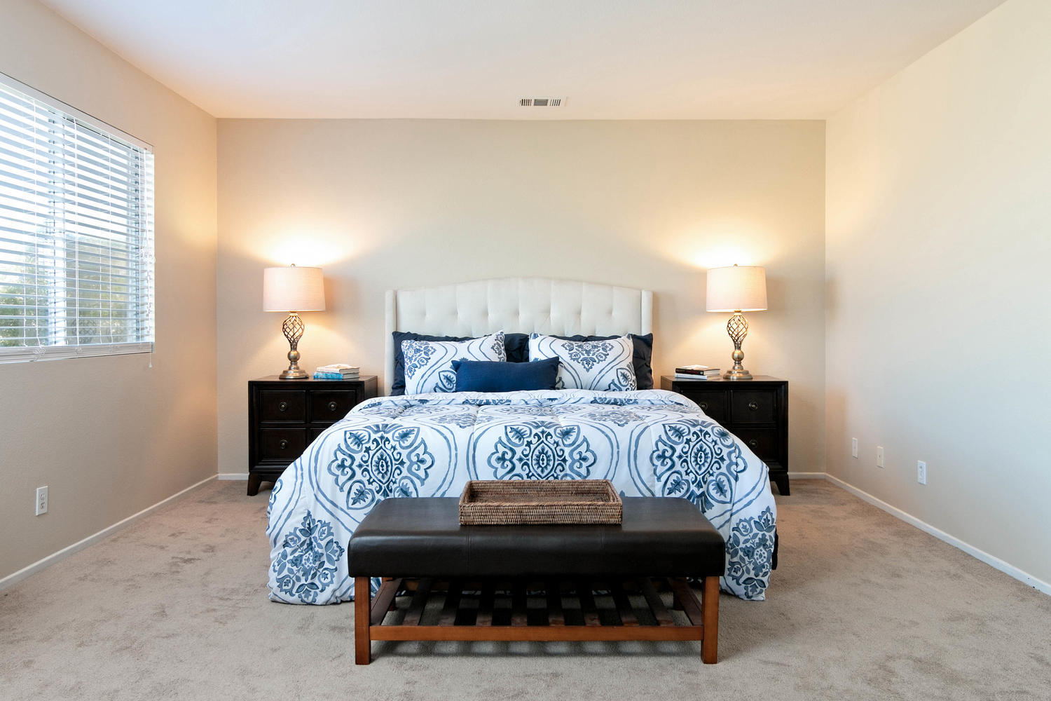 1423 Lorena Drive Oxnard, CA 93030 - Photo 16 of 30 a bed sitting in a bedroom next to a lamp