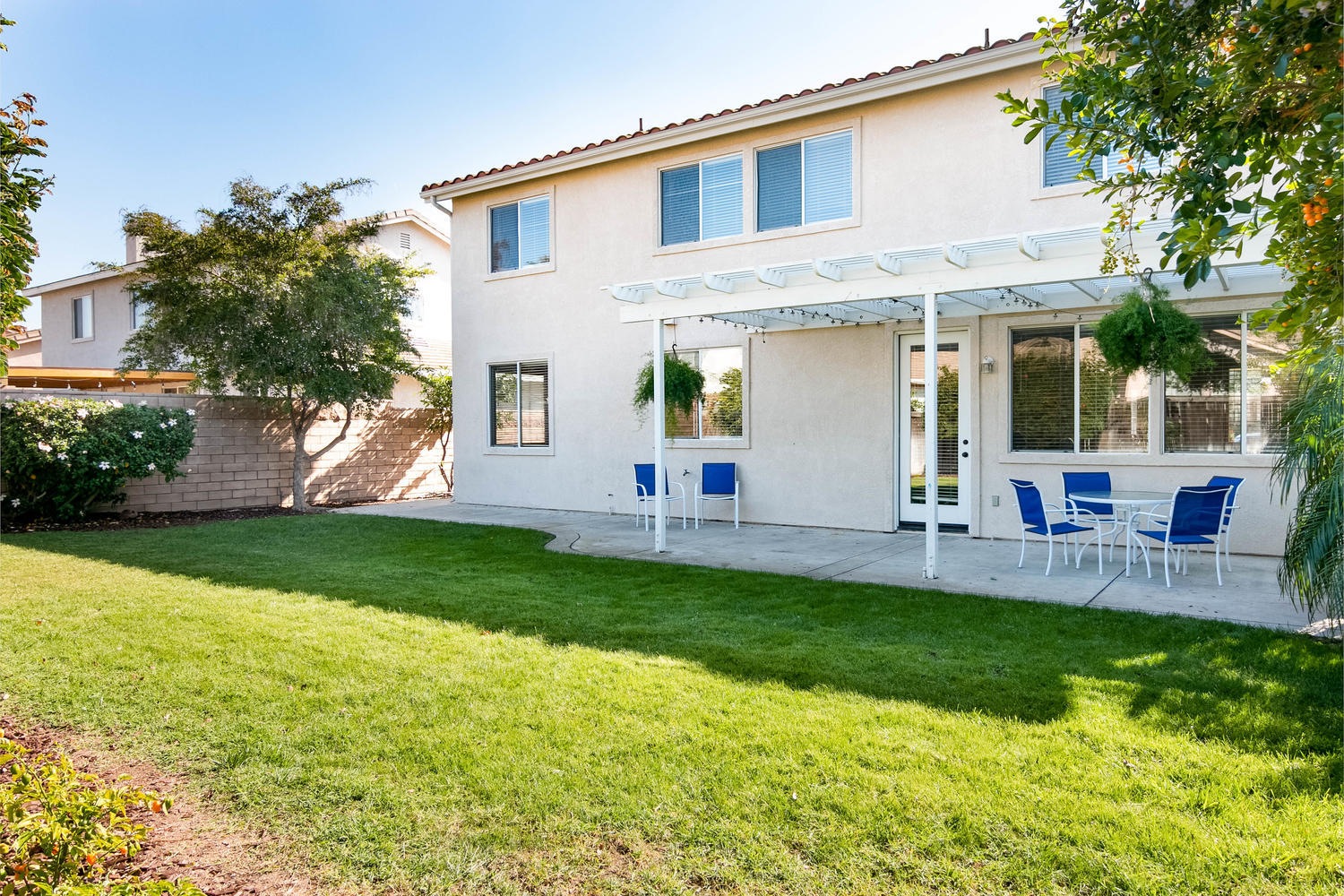 1423 Lorena Drive Oxnard, CA 93030 - Photo 28 of 30 a front view of house with a garden and patio