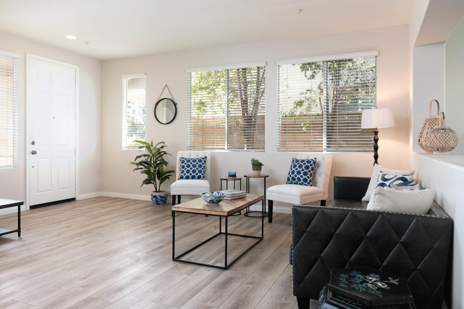 1423 Lorena Drive Oxnard, CA 93030 - Photo 6 of 30 a living room with furniture wooden floor and a large window
