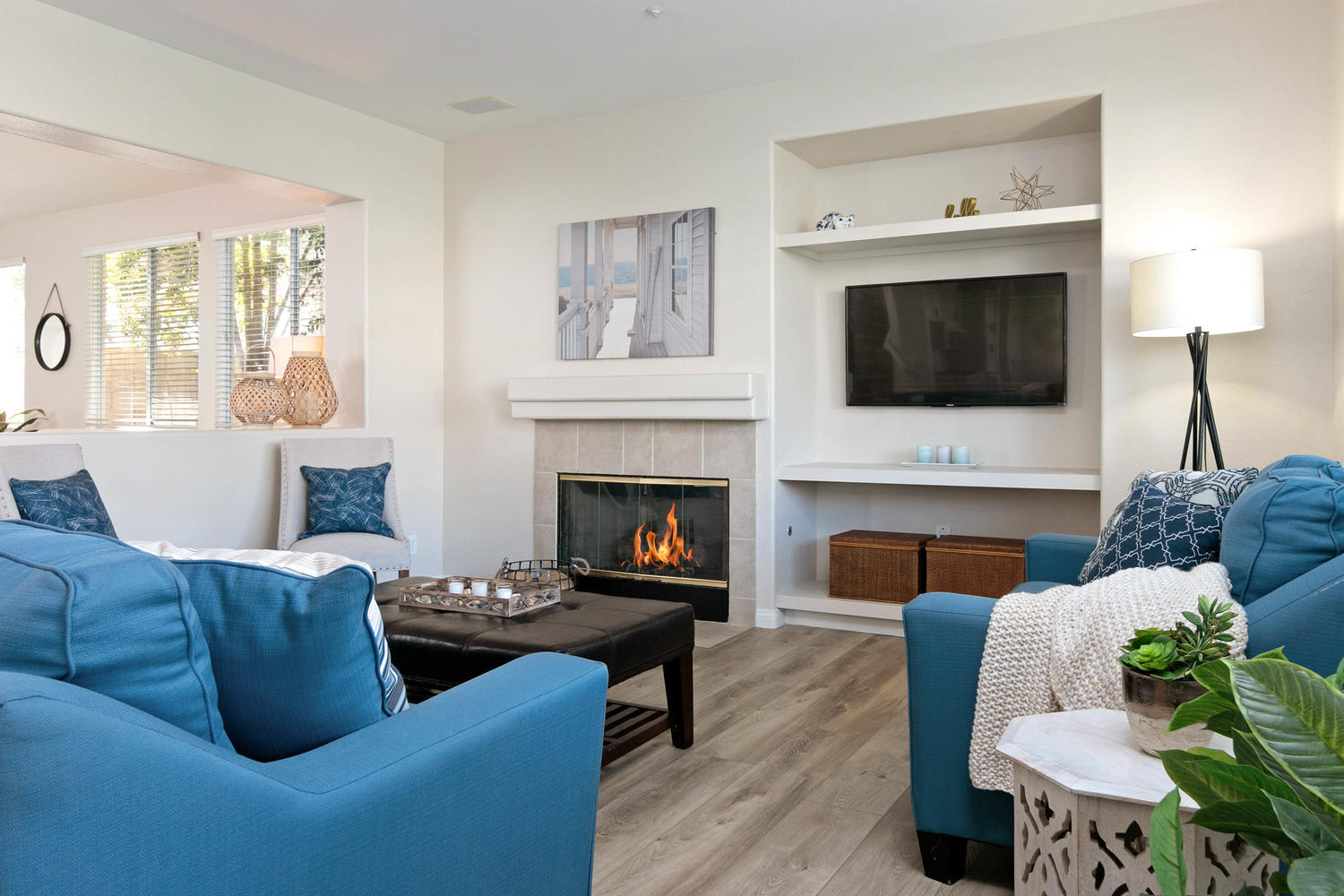 1423 Lorena Drive Oxnard, CA 93030 - Photo 8 of 30 a living room with furniture a fireplace and a flat screen tv