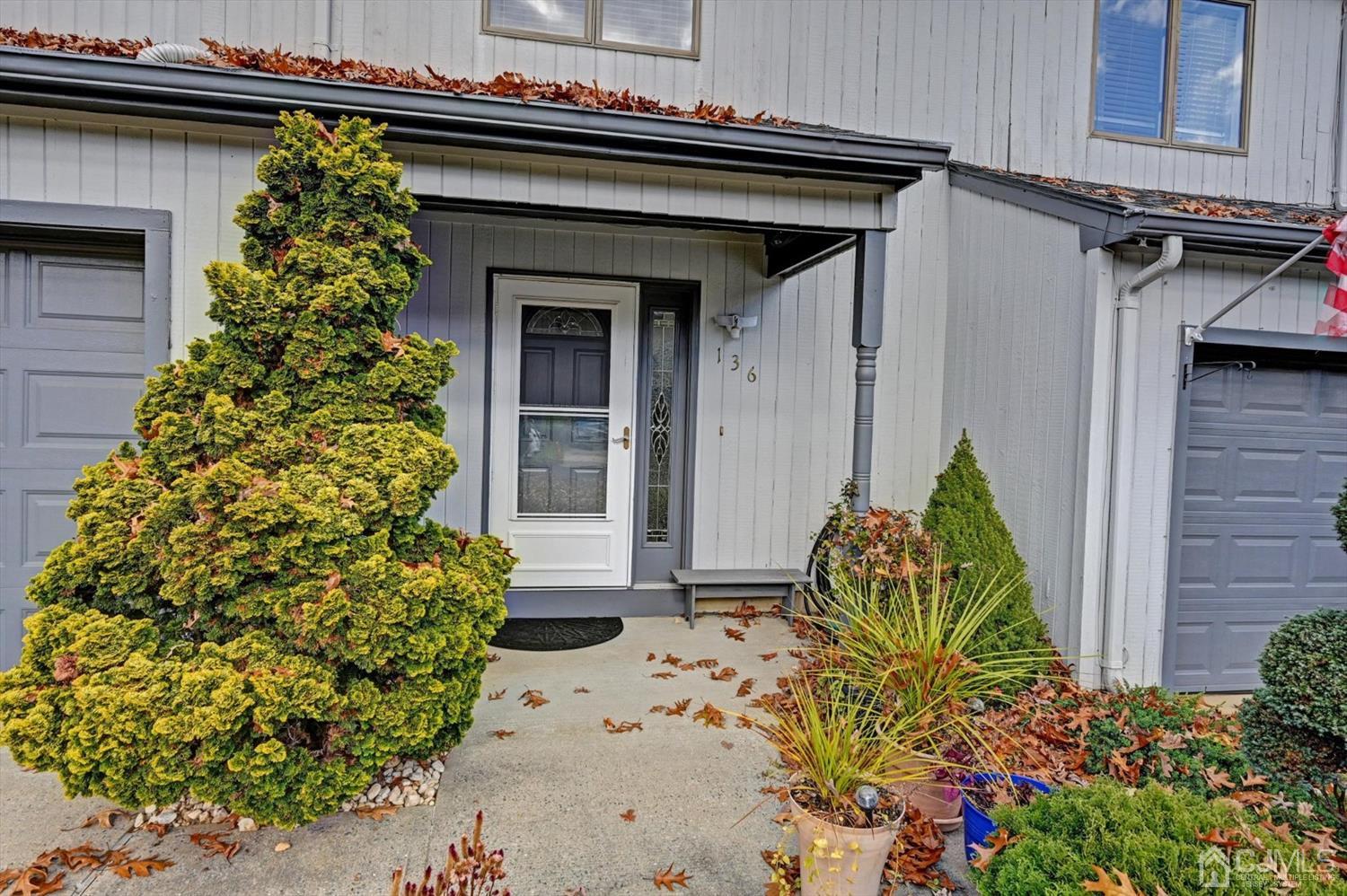 136 Redpine Loop Old Bridge, NJ 08857 - Photo 2 of 31 a front view of a house