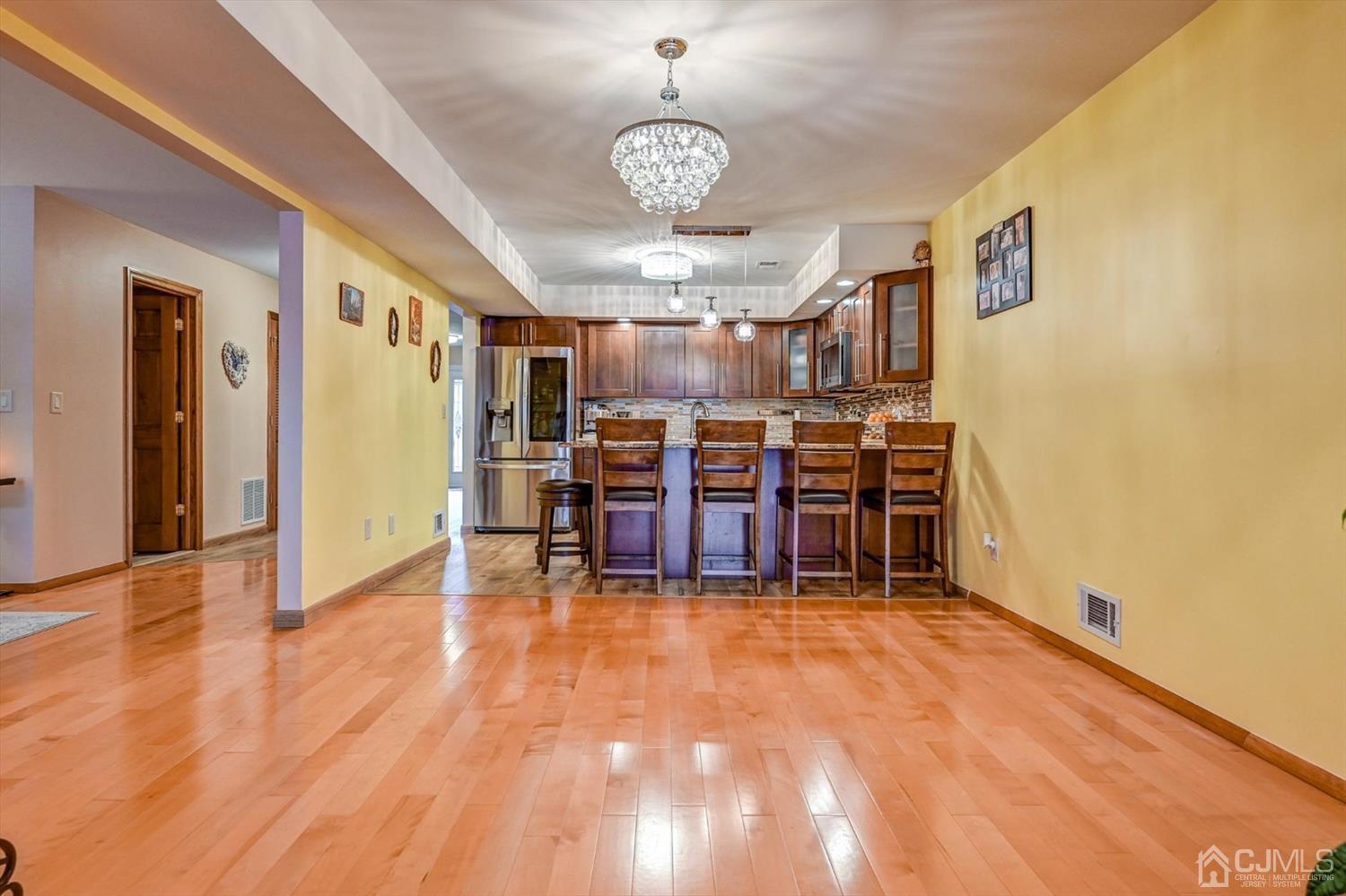 136 Redpine Loop Old Bridge, NJ 08857 - Photo 11 of 31 a view of a room with furniture and chandelier