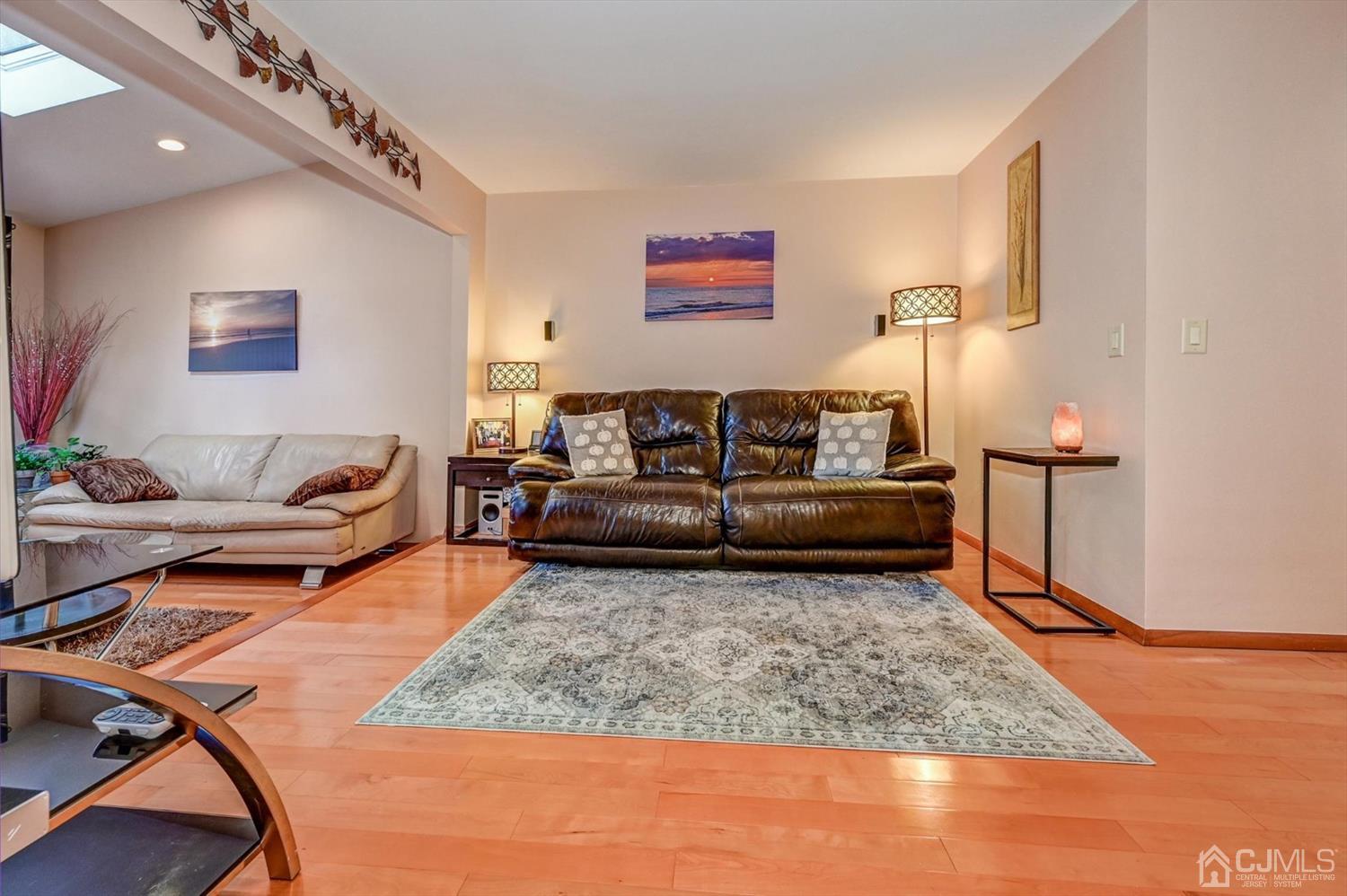136 Redpine Loop Old Bridge, NJ 08857 - Photo 13 of 31 a living room with furniture rug and wooden floor