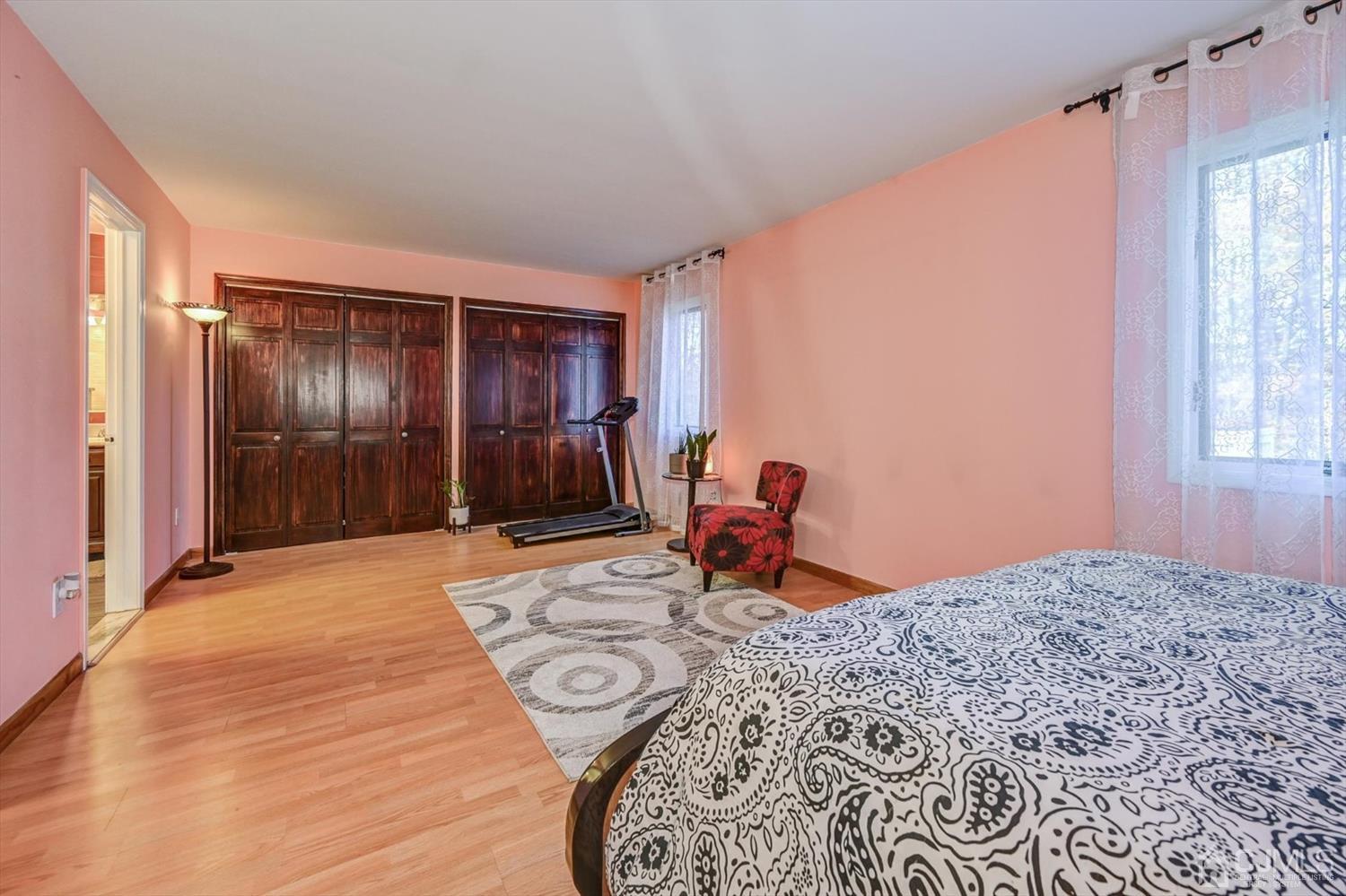 136 Redpine Loop Old Bridge, NJ 08857 - Photo 20 of 31 a bed room with a bed and a window