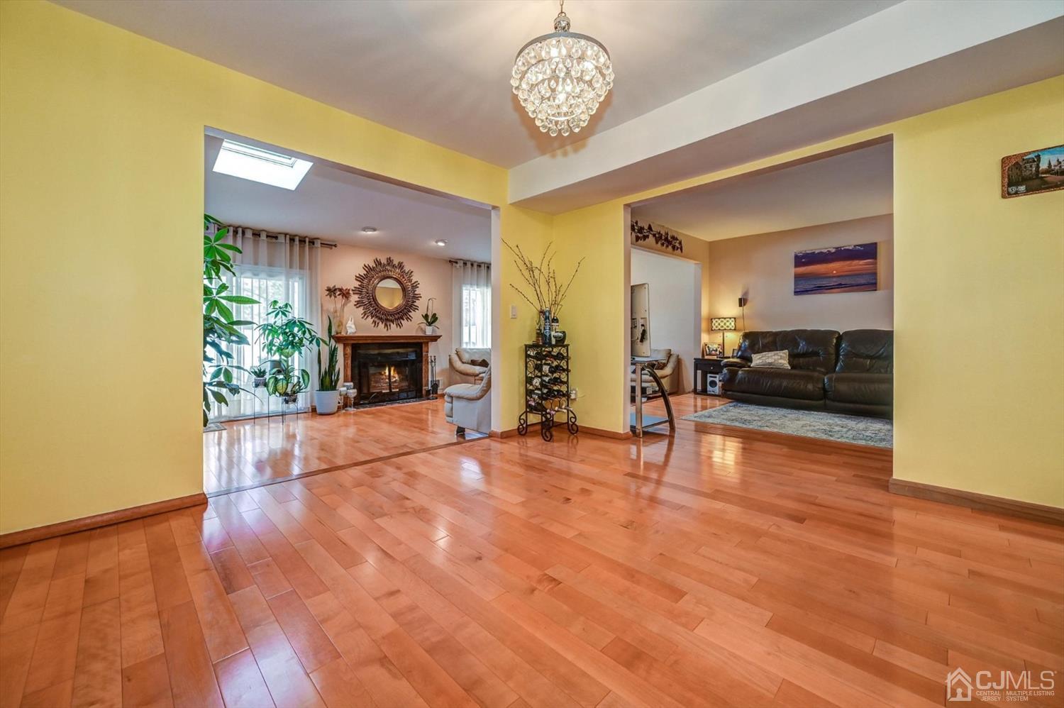 136 Redpine Loop Old Bridge, NJ 08857 - Photo 9 of 31 a view of livingroom with furniture and fireplace