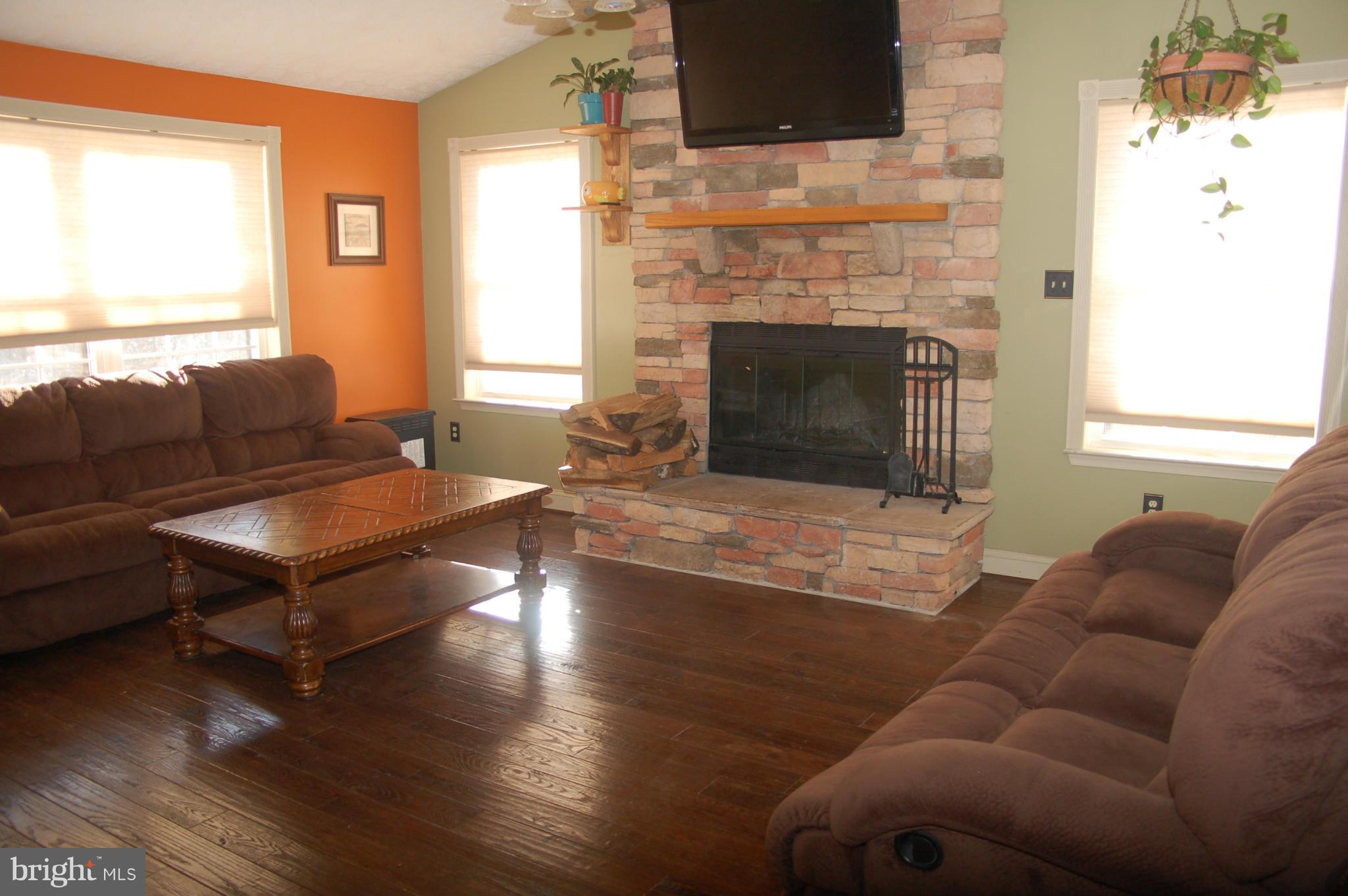 78 Beaver Court Rising Sun, MD 21911 - Photo 14 of 30 a living room with furniture fireplace and window