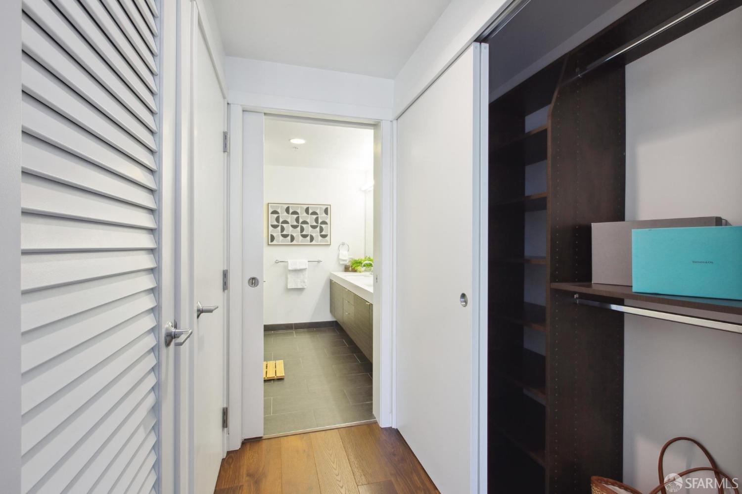 1688 Pine Street, Unit E601 San Francisco, CA 94109 - Photo 15 of 51 a view of hallway with a toilet