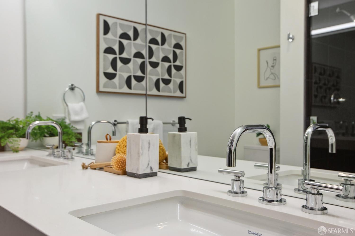 1688 Pine Street, Unit E601 San Francisco, CA 94109 - Photo 18 of 51 a bathroom with a sink and a mirror