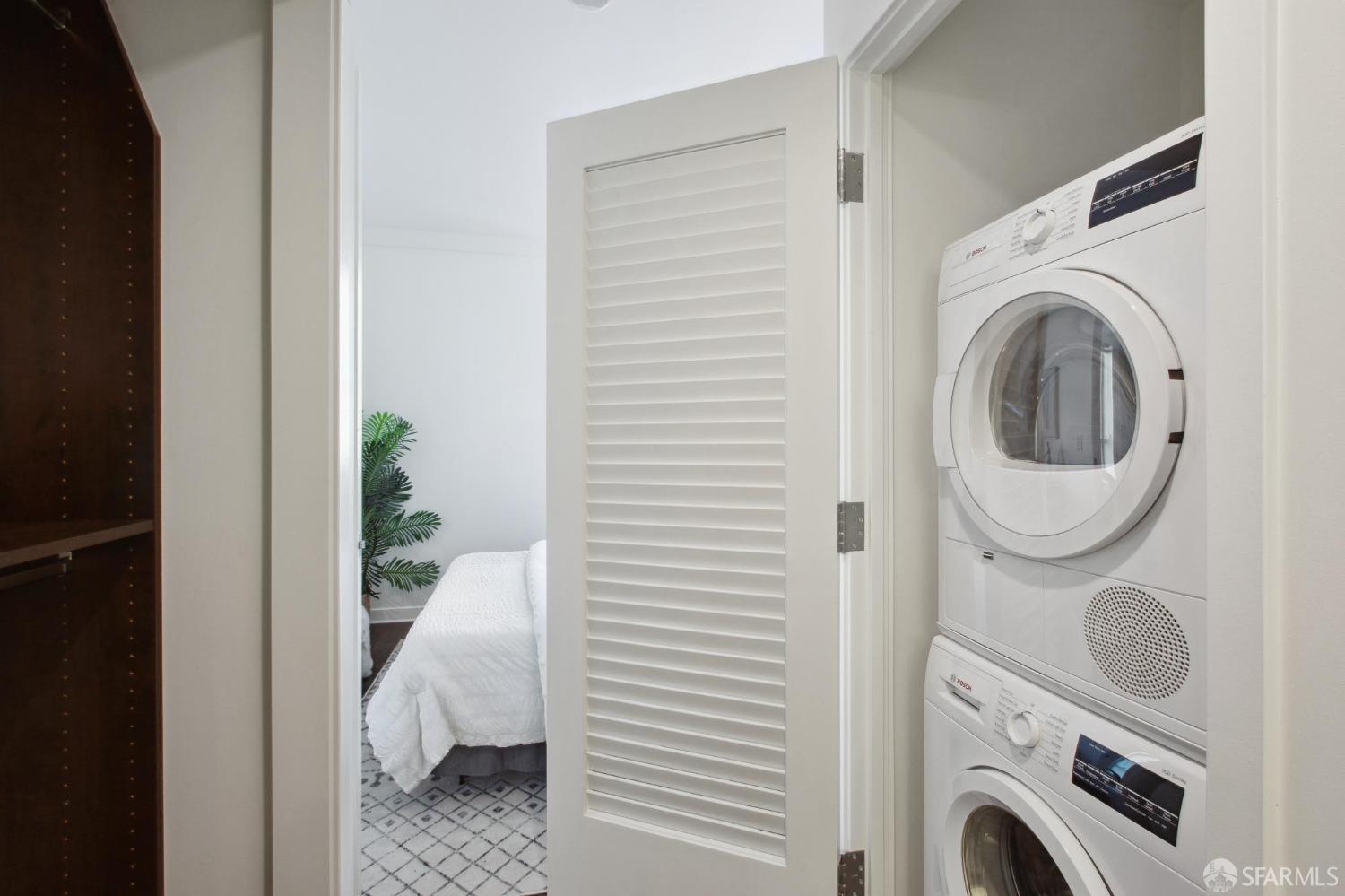 1688 Pine Street, Unit E601 San Francisco, CA 94109 - Photo 24 of 51 a utility room with dryer and washer