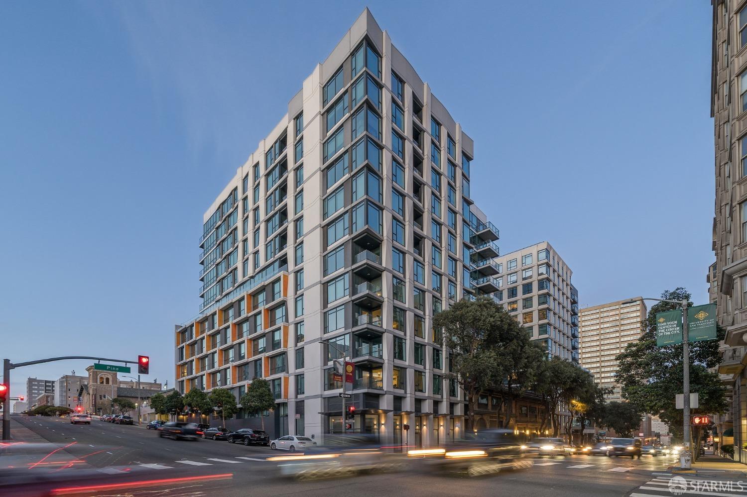 1688 Pine Street, Unit E601 San Francisco, CA 94109 - Photo 28 of 51 a view of a tall building next to a road