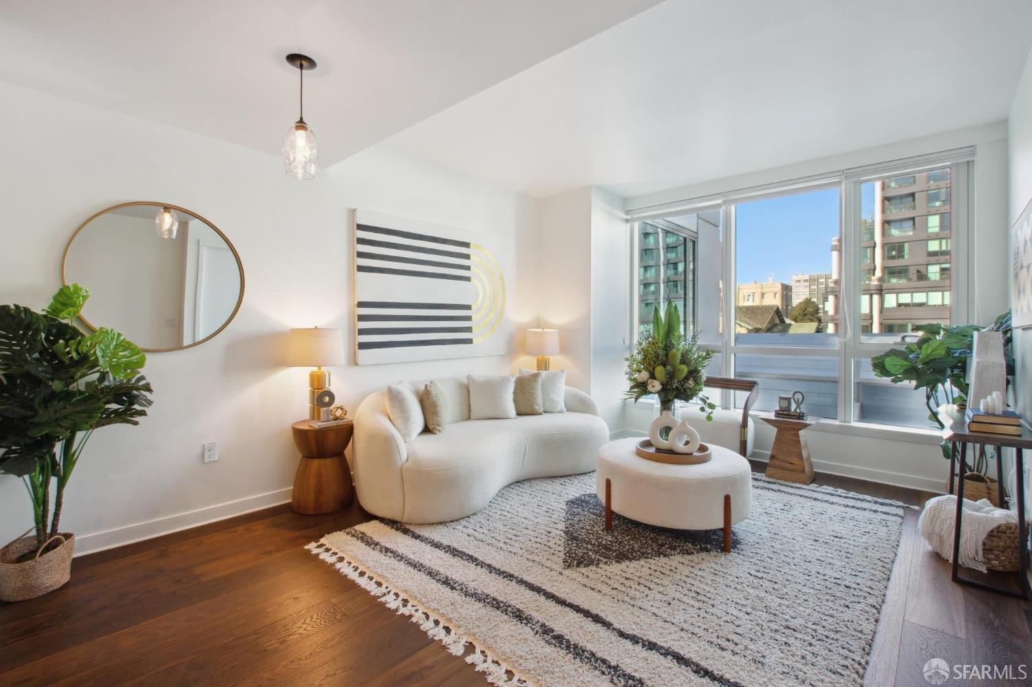 1688 Pine Street, Unit E601 San Francisco, CA 94109 - Photo 3 of 51 a living room with furniture potted plant and a window