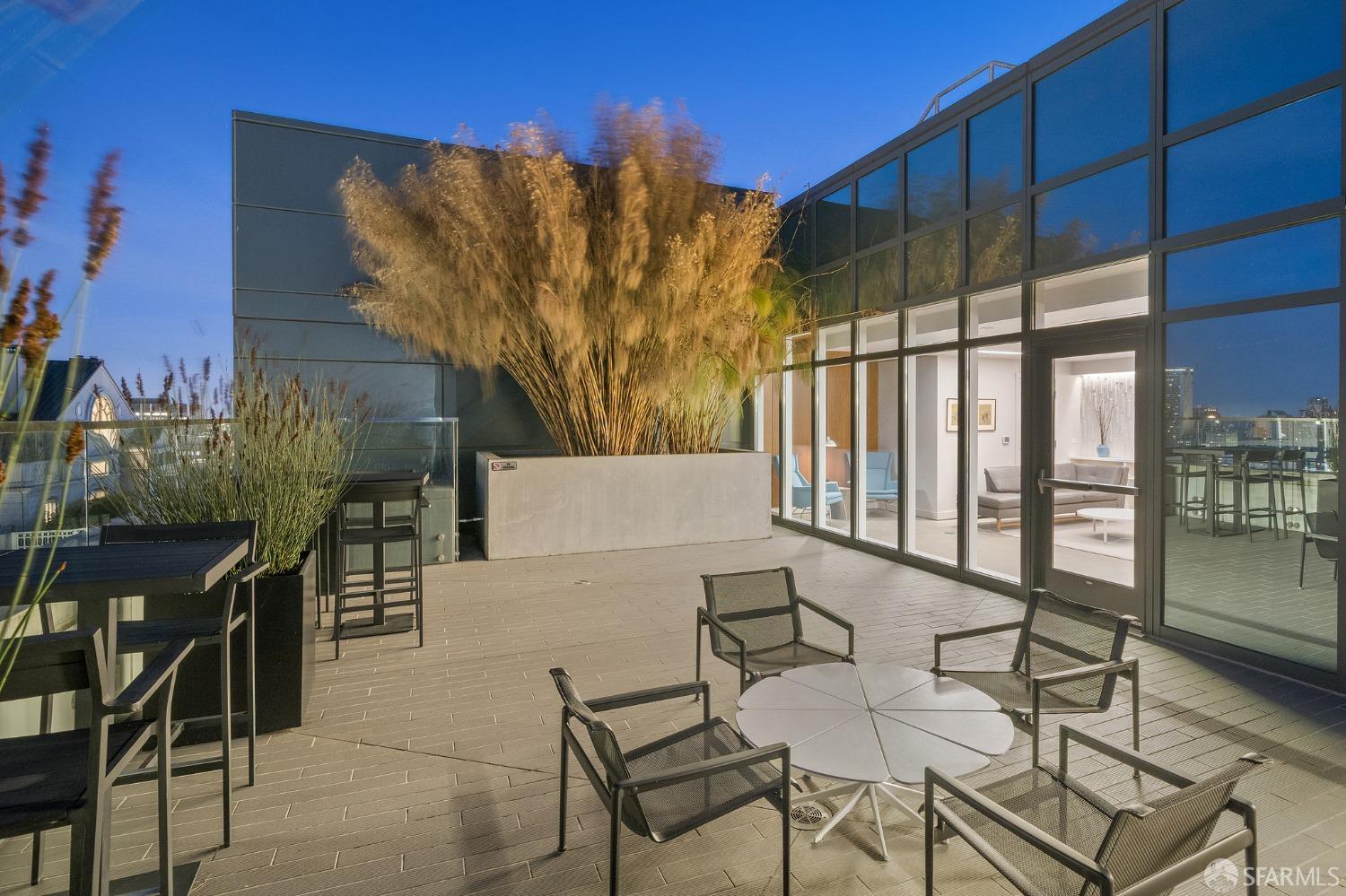 1688 Pine Street, Unit E601 San Francisco, CA 94109 - Photo 37 of 51 a view of a chairs and table in patio