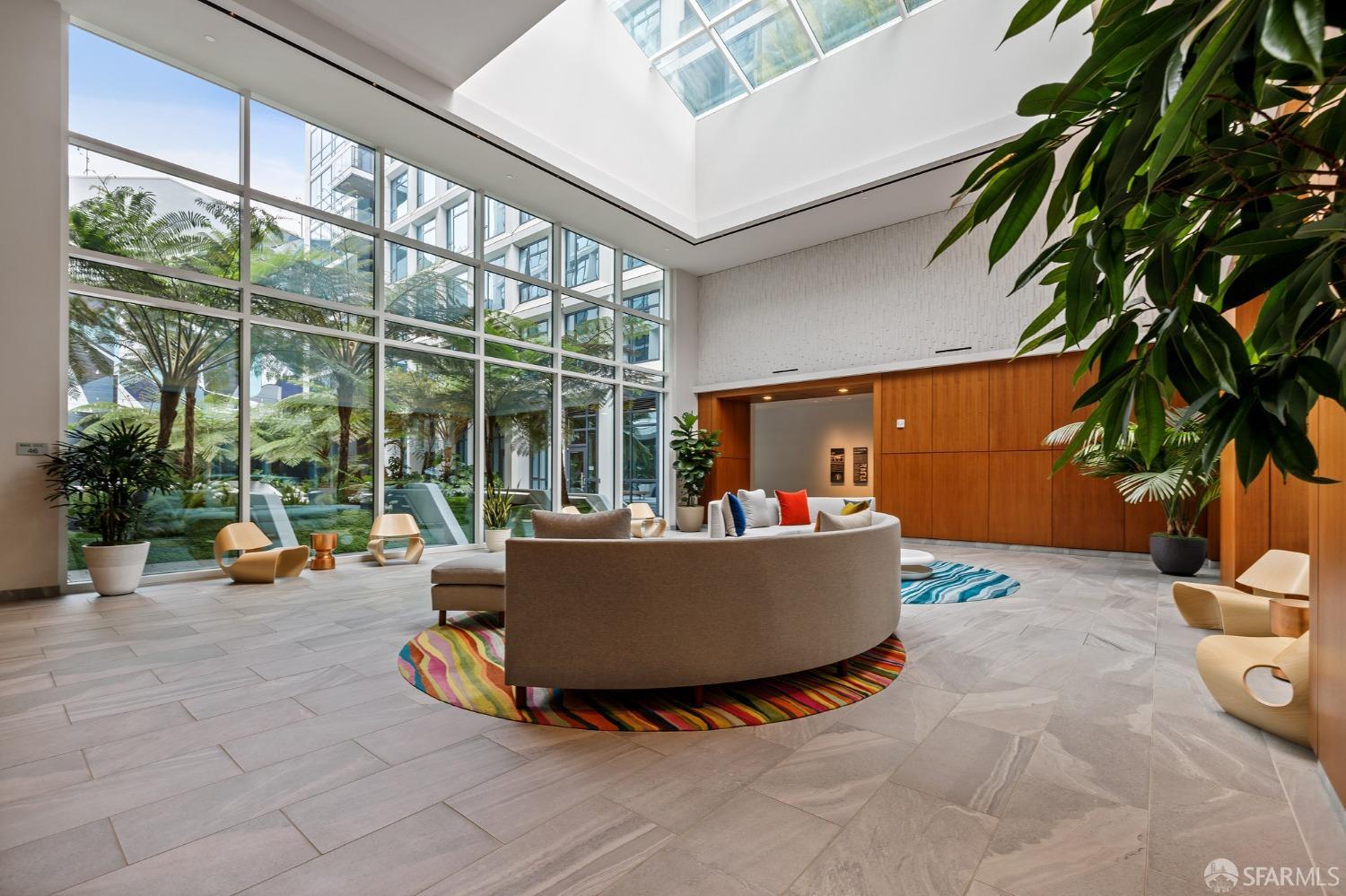 1688 Pine Street, Unit E601 San Francisco, CA 94109 - Photo 40 of 51 a living room with patio furniture and a potted plant
