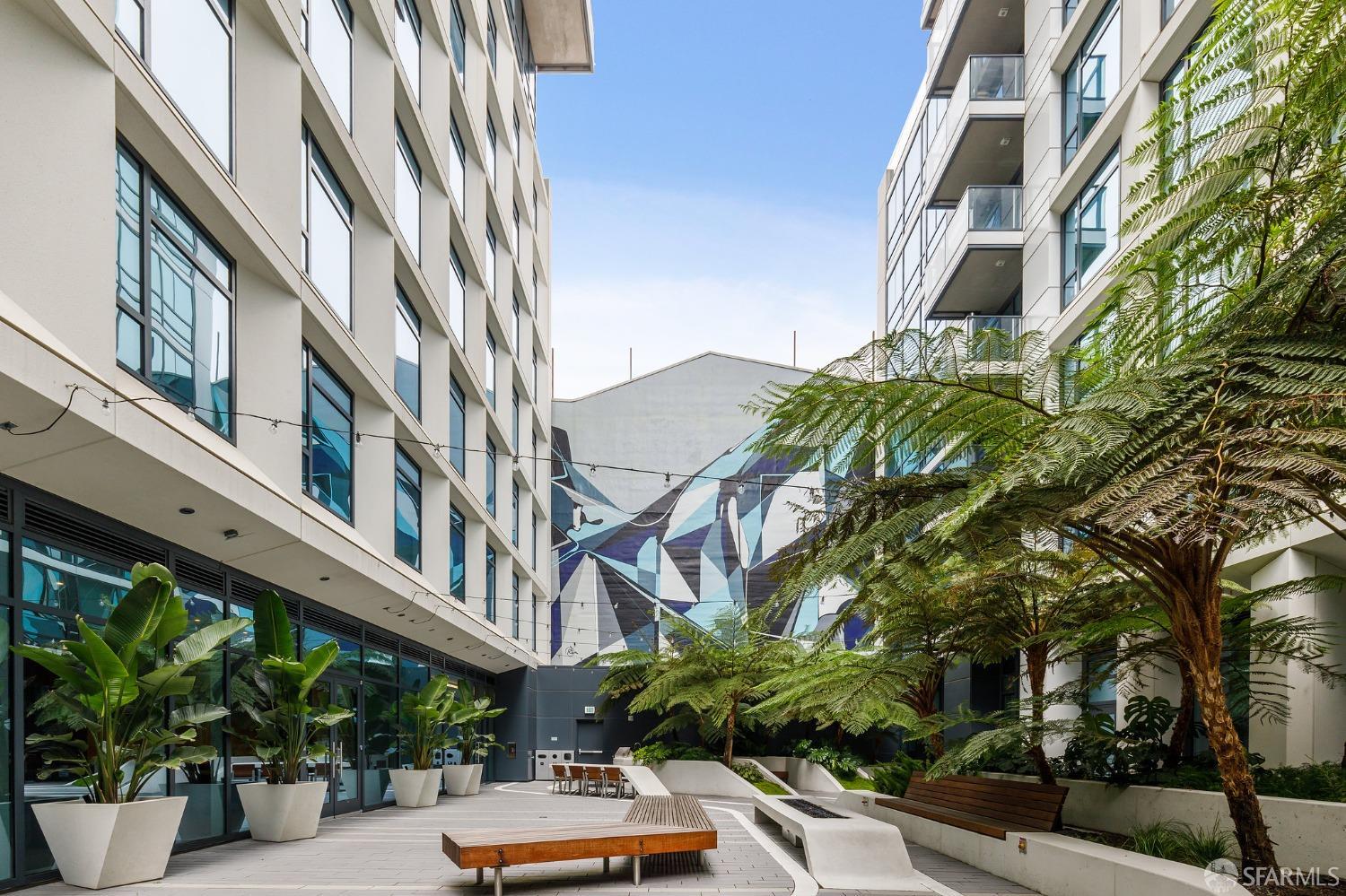 1688 Pine Street, Unit E601 San Francisco, CA 94109 - Photo 42 of 51 a view of a building and car parked
