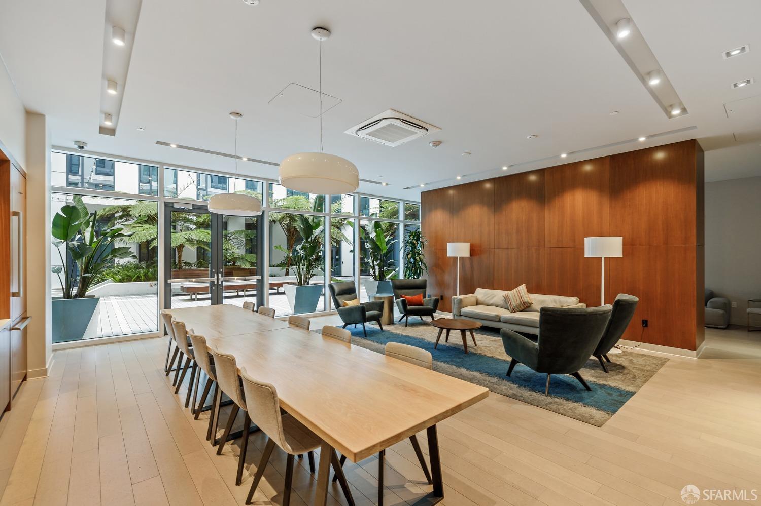 1688 Pine Street, Unit E601 San Francisco, CA 94109 - Photo 43 of 51 a living room with furniture a ceiling fan and a large window