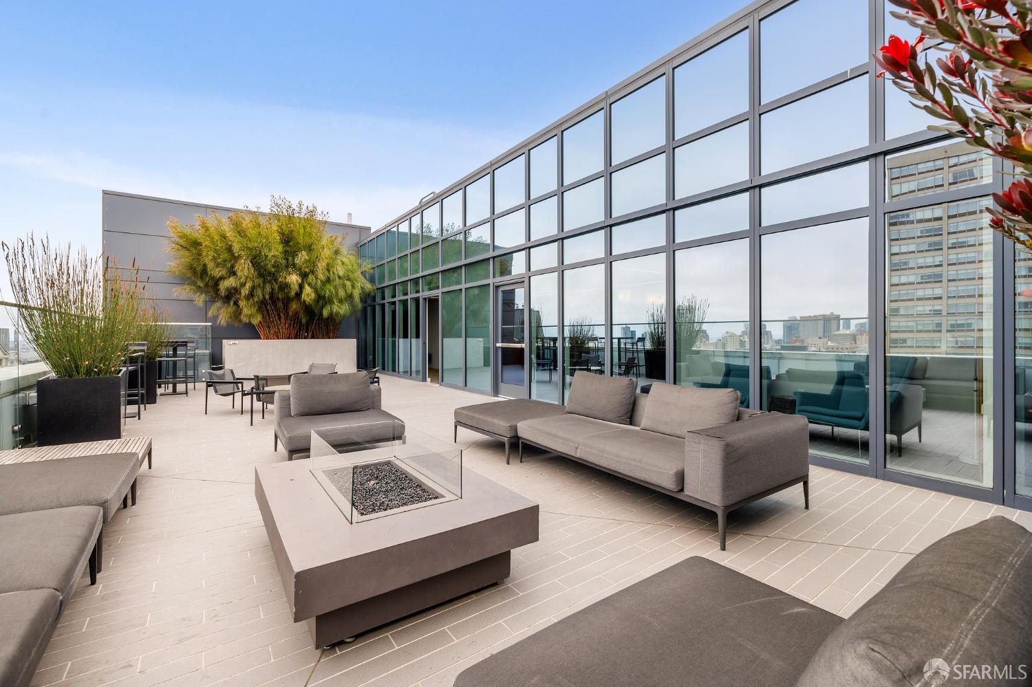 1688 Pine Street, Unit E601 San Francisco, CA 94109 - Photo 49 of 51 a living room with furniture and a large window