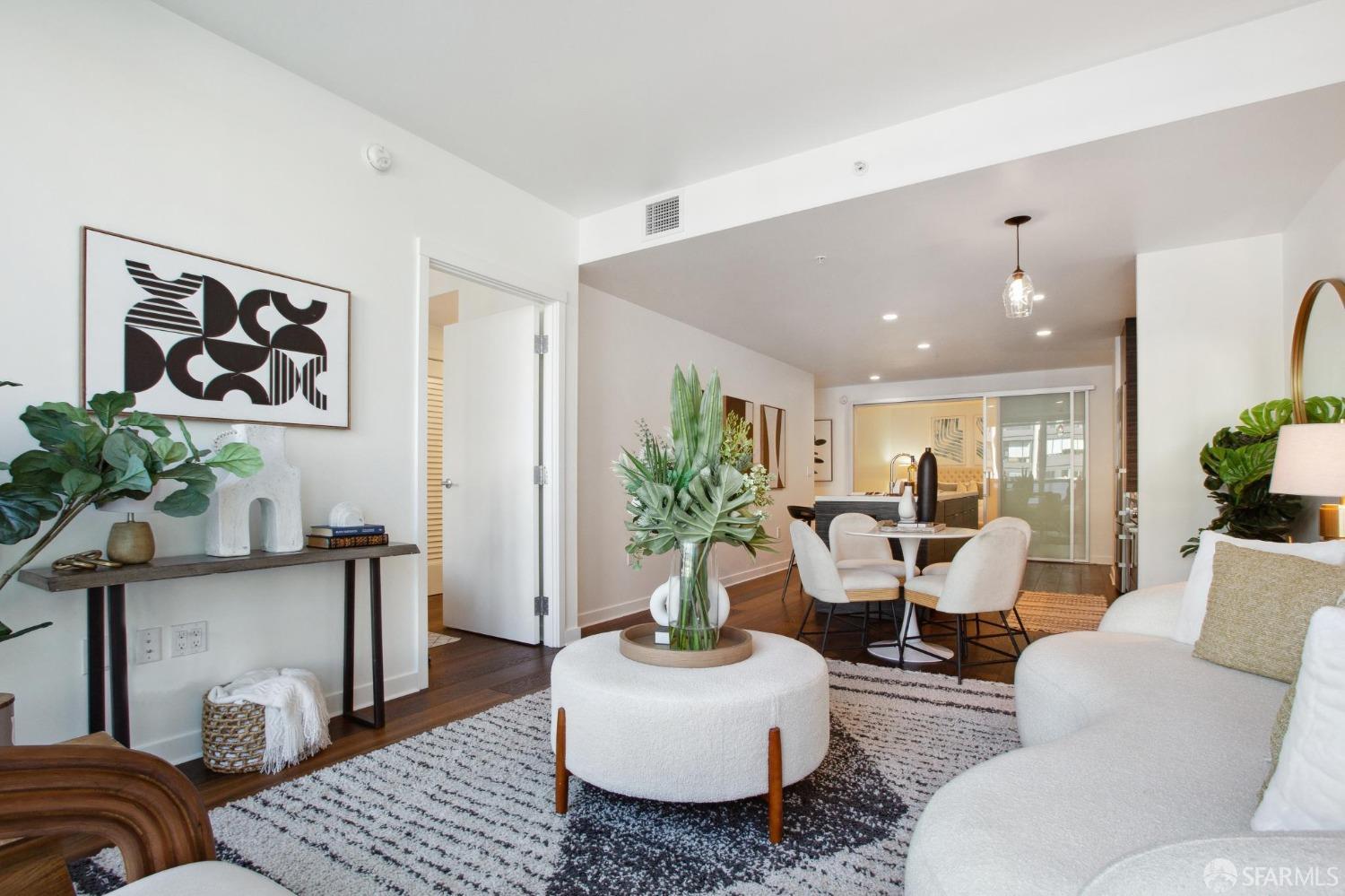 1688 Pine Street, Unit E601 San Francisco, CA 94109 - Photo 7 of 51 a living room with furniture and wooden floor