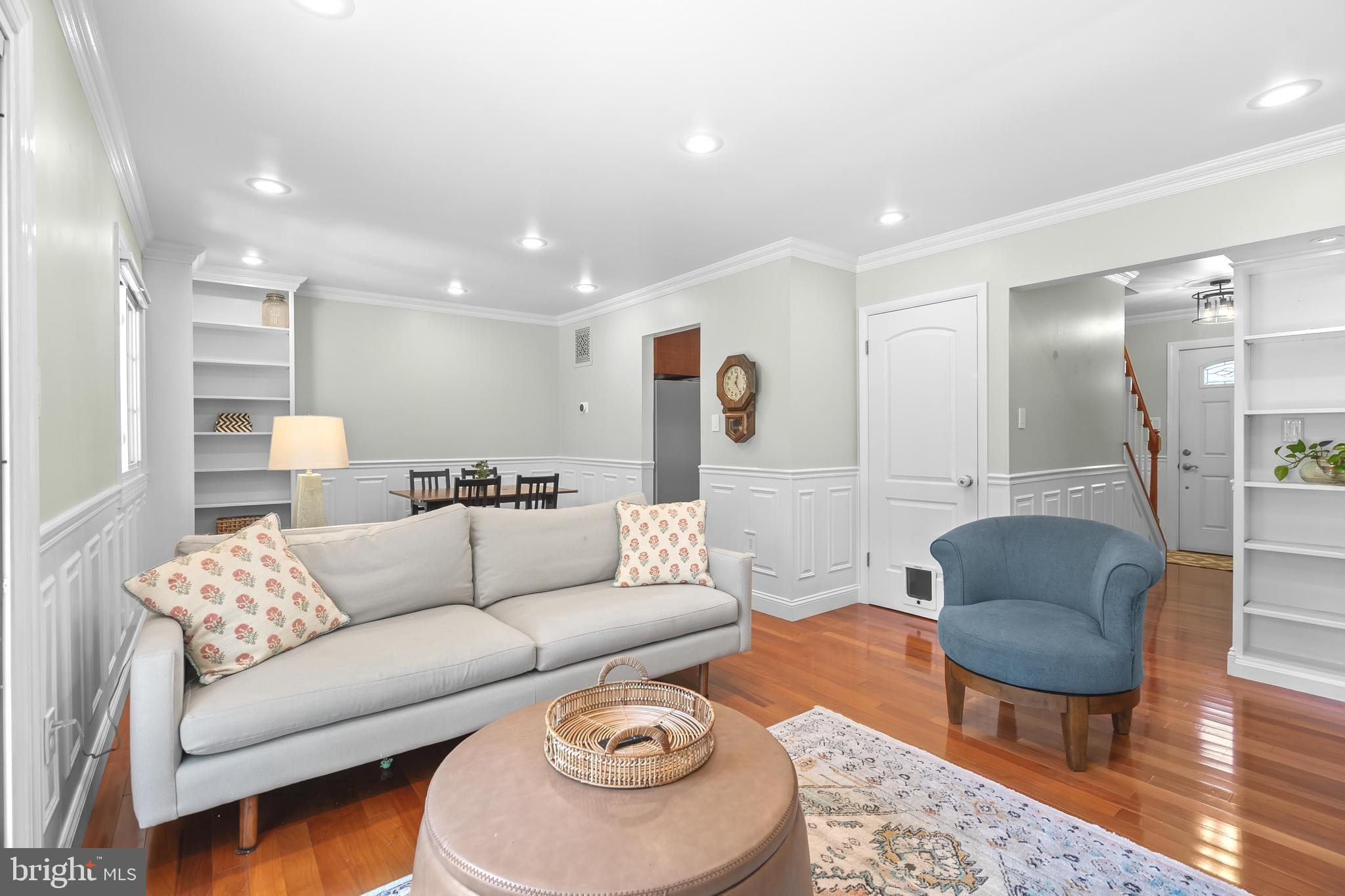 7029 Leewood Forest Drive Springfield, VA 22151 - Photo 17 of 45 a living room with furniture and a rug