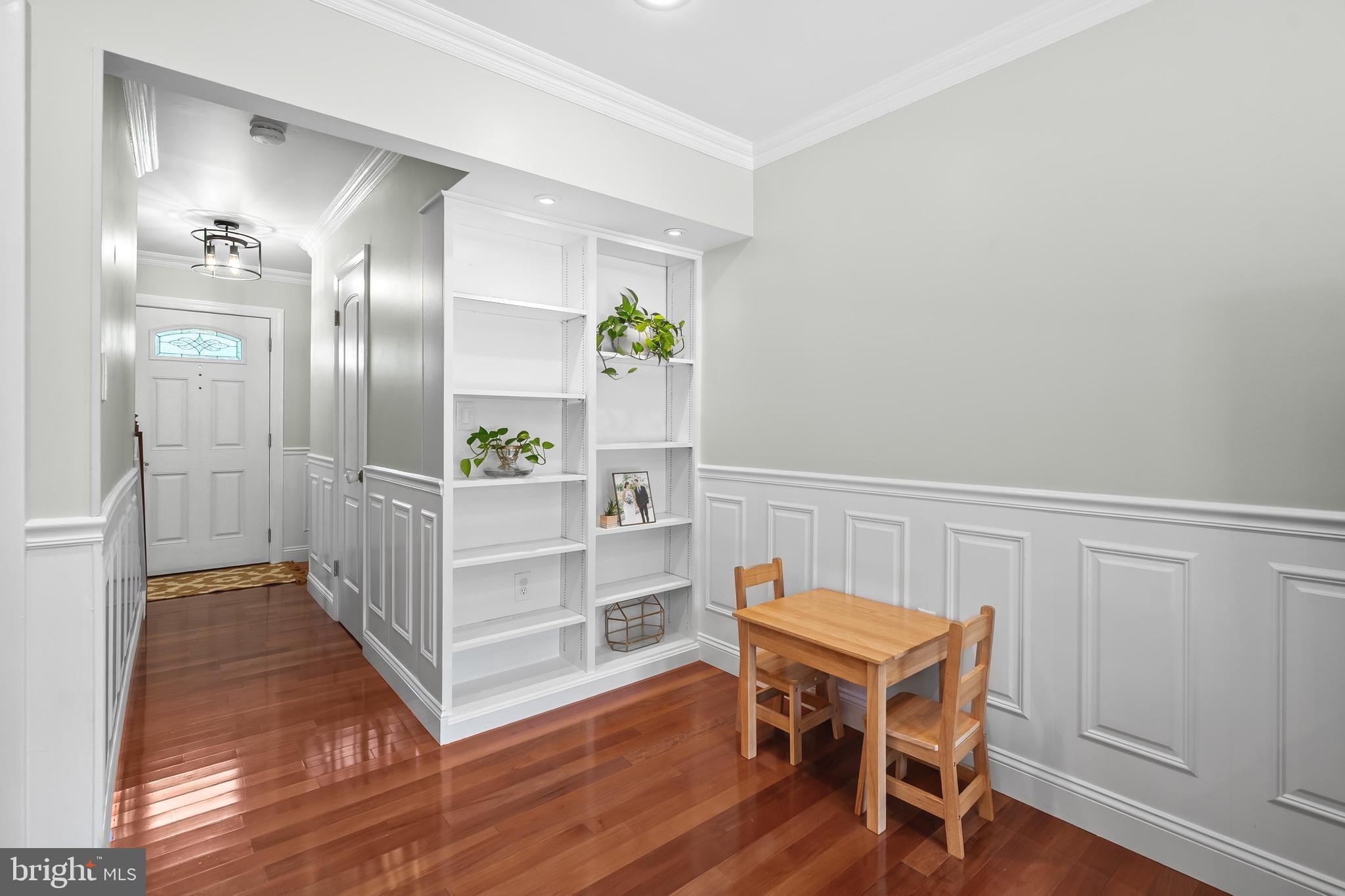 7029 Leewood Forest Drive Springfield, VA 22151 - Photo 18 of 45 a view of a livingroom with furniture and wooden floor