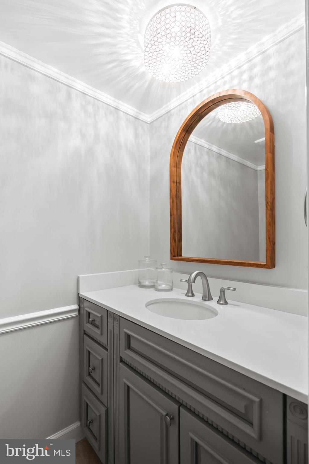 7029 Leewood Forest Drive Springfield, VA 22151 - Photo 19 of 45 a bathroom with a sink and a mirror