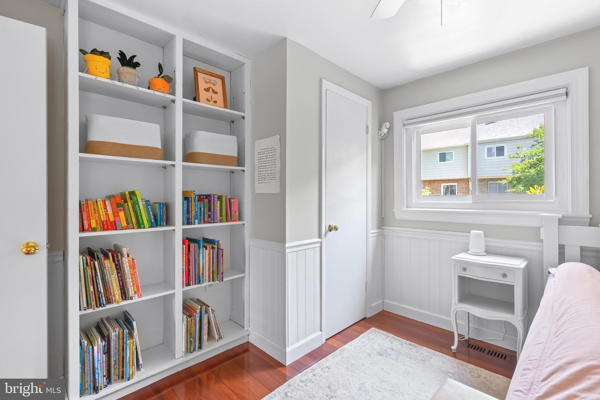 7029 Leewood Forest Drive Springfield, VA 22151 - Photo 27 of 45 a view of room with furniture and book shelf