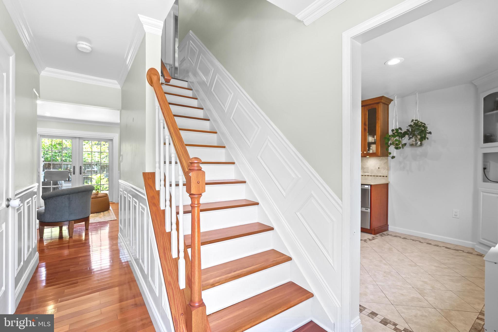 7029 Leewood Forest Drive Springfield, VA 22151 - Photo 3 of 45 a view of entryway and hall with wooden floor