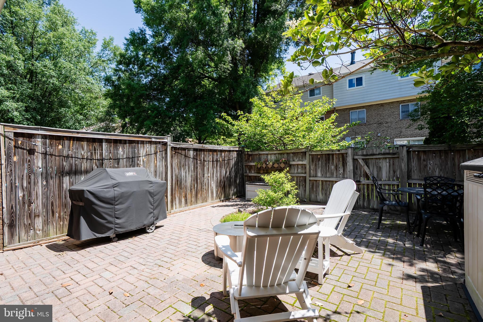 7029 Leewood Forest Drive Springfield, VA 22151 - Photo 38 of 45 a view of a deck with furniture and a chairs