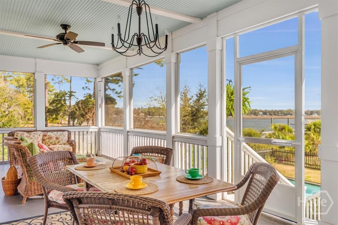 690 Japonica Road Midway, GA 31320 - Photo 32 of 70 500+/- SF screened porch for indoor/outdoor living.