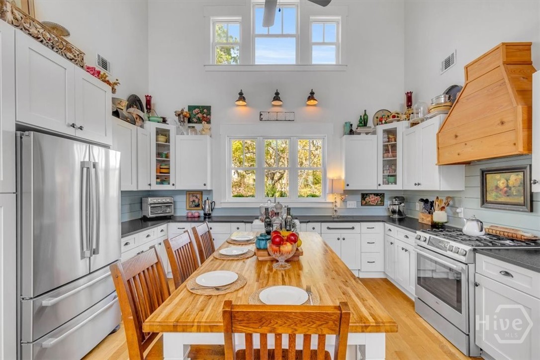 690 Japonica Road Midway, GA 31320 - Photo 8 of 70 Kitchen: Bosch appliances, leathered granite, center island, and ample counter top space.