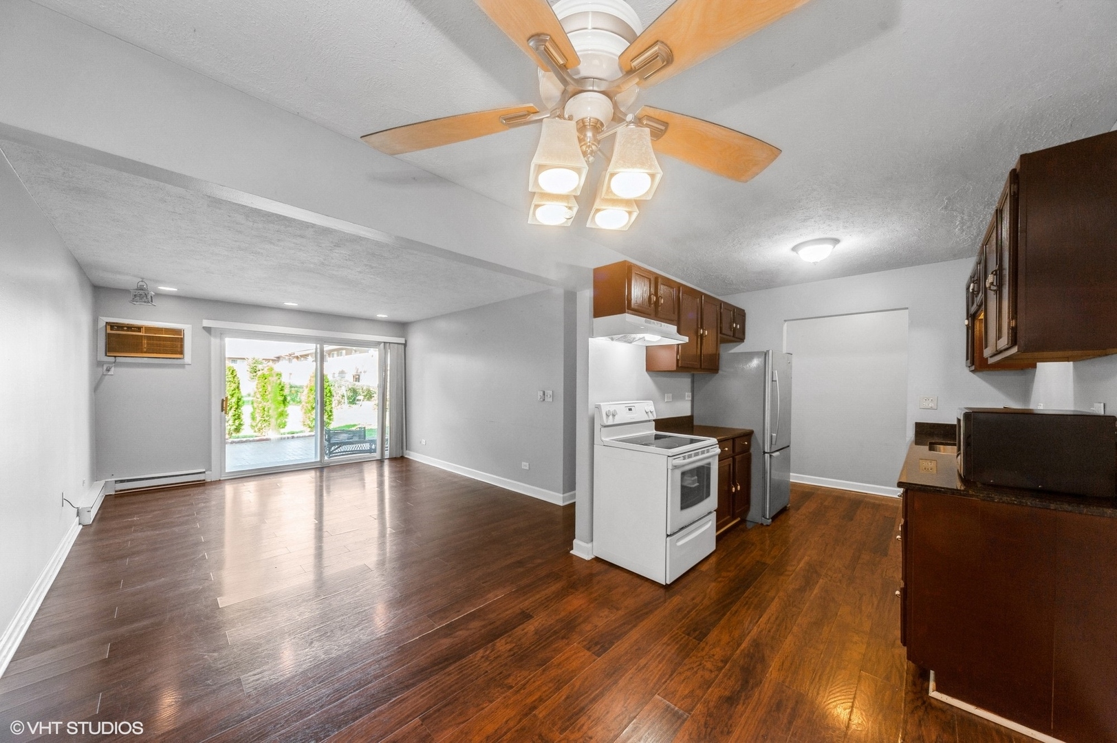 880 East Old Willow Road, Unit 175 Prospect Heights, IL 60070 - Photo 2 of 12 a kitchen with a refrigerator and a stove top oven