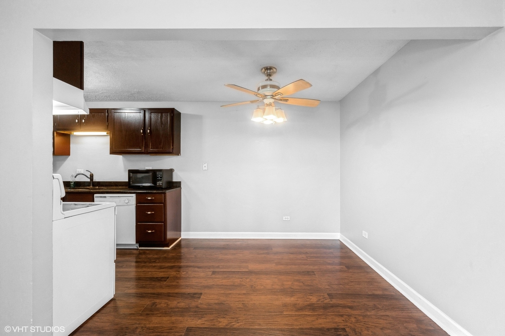 880 East Old Willow Road, Unit 175 Prospect Heights, IL 60070 - Photo 4 of 12 a view of kitchen with sink microwave and stove