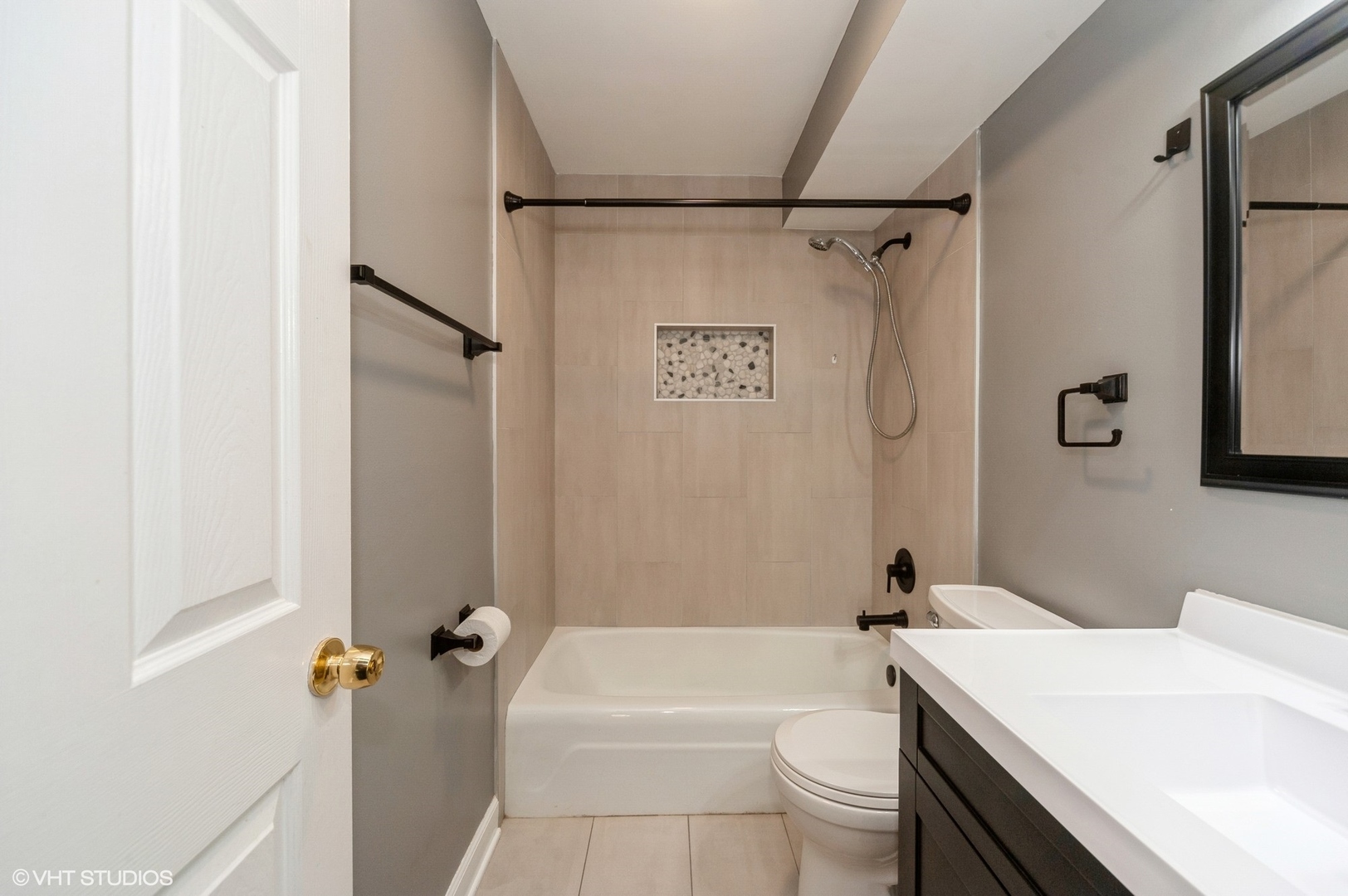 880 East Old Willow Road, Unit 175 Prospect Heights, IL 60070 - Photo 5 of 12 a bathroom with a sink a toilet a mirror and shower