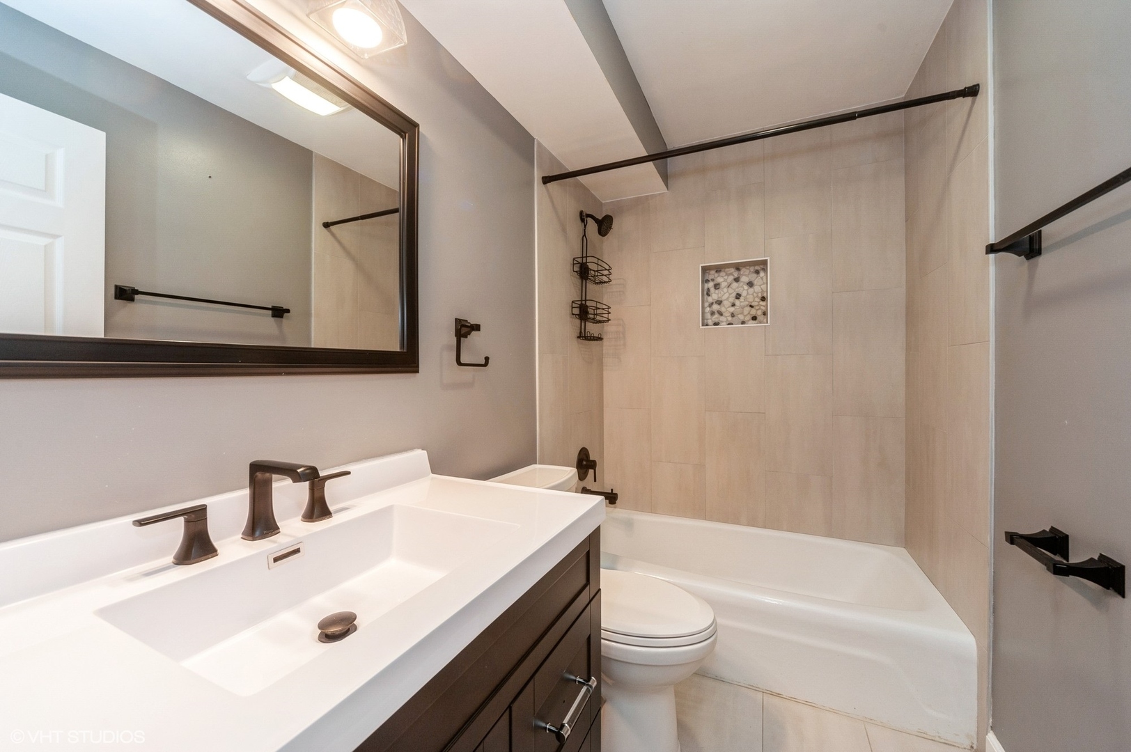 880 East Old Willow Road, Unit 175 Prospect Heights, IL 60070 - Photo 6 of 12 a bathroom with a sink a toilet and shower