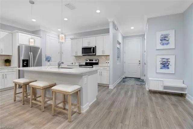 $700,000 | 12973 Pembroke Drive, Naples, FL 34105