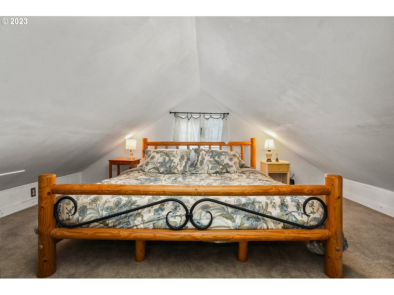 21 Prairie Road Appleton, WA 98602 - Photo 26 of 39 a bedroom with a bed and window