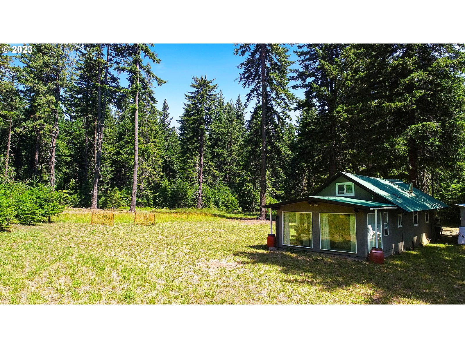 21 Prairie Road Appleton, WA 98602 - Photo 5 of 39 a view of a house with a backyard